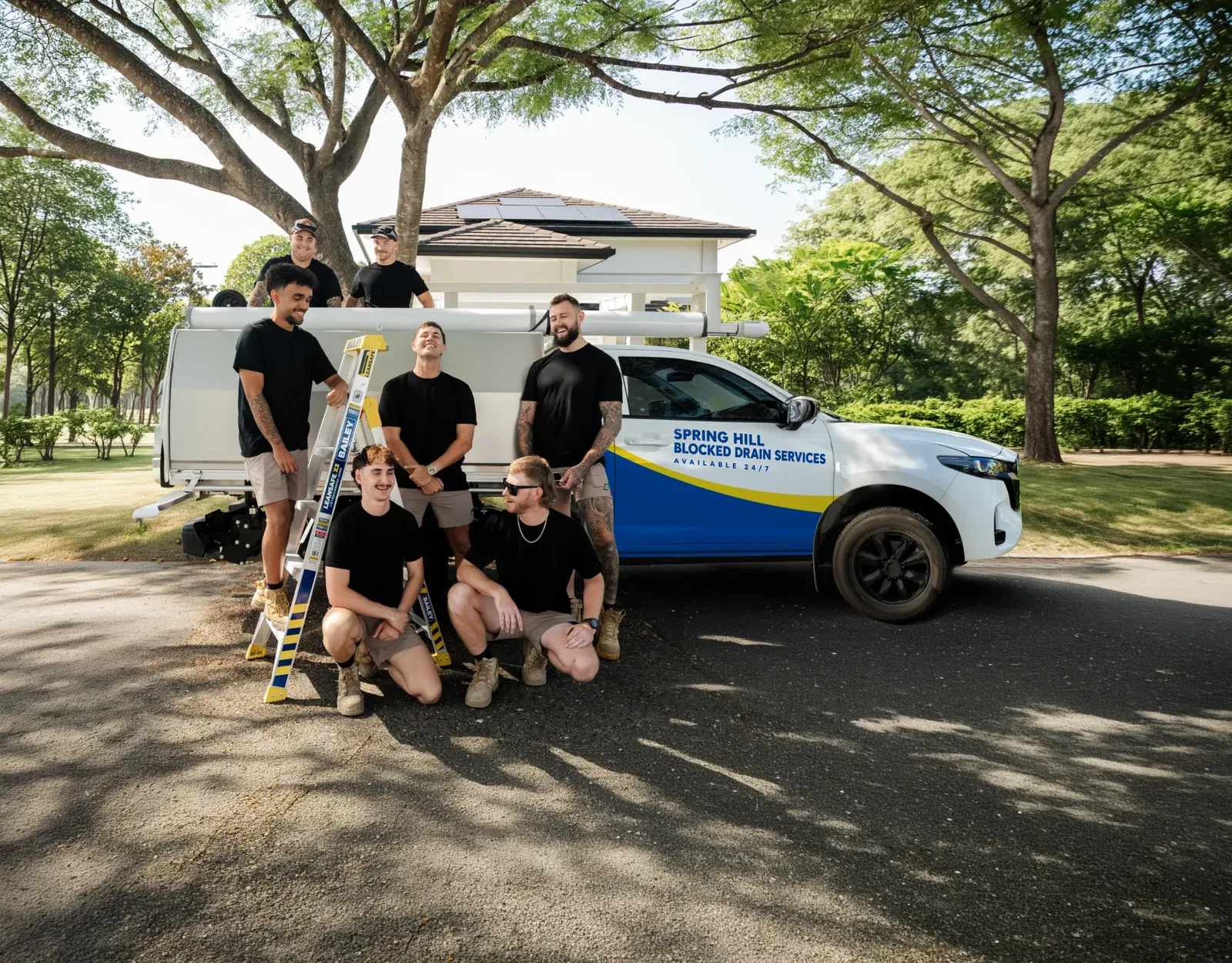 Spring Hill Blocked Drain Services ute and team